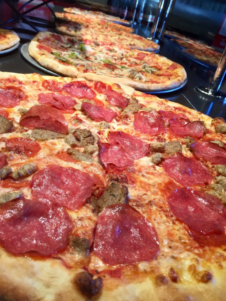 Selection of pizzas from Vicini's New York Pizzeria